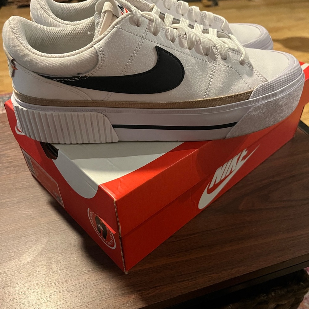 Nike Women’s White and Black Sneakers